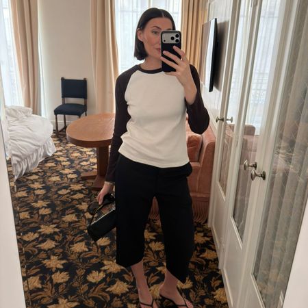 An image of @sarahlouiseblythe wearing tassel trousers, one of the best anti-jeans summer trouser trends with a tassel top. 